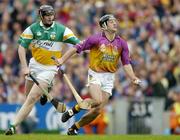 4 July 2004; Declan Ruth, Wexford, in action against Joe Brady, Offaly. Guinness Leinster Senior Hurling Championship Final, Offaly v Wexford, Croke Park, Dublin. Picture credit; Brendan Moran / SPORTSFILE