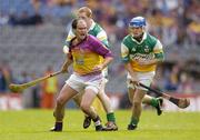 4 July 2004; Adrian Fenlon, Wexford, in action against Barry Whelahan, Offaly. Guinness Leinster Senior Hurling Championship Final, Offaly v Wexford, Croke Park, Dublin. Picture credit; Brendan Moran / SPORTSFILE