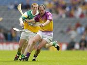 4 July 2004; Adrian Fenlon, Wexford, in action against Barry Whelahan, Offaly. Guinness Leinster Senior Hurling Championship Final, Offaly v Wexford, Croke Park, Dublin. Picture credit; Brendan Moran / SPORTSFILE