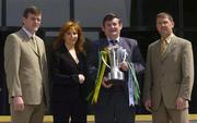 7 July 2004; Limerick manager Liam Kearns, left, Lisa Browne, Sponsorship Manager, Bank of Ireland, Munster Council Chairman, Sean Fogarty, holding the Munster Final Cup, second from right, and Kerry manager Jack O'Connor, right, at a photocall ahead of this week-end's Ulster and Munster provincial finals. Bank of Ireland Head Office, Baggot Street, Dublin. Picture credit; Pat Murphy / SPORTSFILE