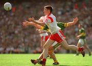 24 August 2003; Enda McGinley of Tyrone in action against John Crowley of Kerry during the Bank of Ireland All-Ireland Senior Football Championship Semi-Final match between Tyrone and Kerry at Croke Park in Dublin. Photo by Damien Eagers/Sportsfile