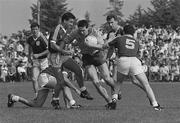 22 July 1990; John Newton, Roscommon, is tackled by Brian Moylan, left, and John Fallon, 5, Galway. Galway v Roscommon, Connacht Football Championship Finals, Dr Hide Park, Co. Roscommon. Picture credit; Ray McManus / SPORTSFILE
