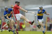 10 July 2004; Wayne Sherlock, Cork, in action against Benny Dunne, left, and Paul Kelly, Tipperary. Guinness Senior Hurling Championship Qualifier, Round 3, Cork v Tipperary, Fitzgerald Stadium, Killarney, Co. Kerry. Picture credit; Brendan Moran / SPORTSFILE