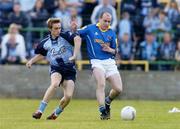 10 July 2004; Padraic Davis, Longford, is tackled by Paul Griffin, Dublin. Bank of Ireland Senior Football Championship Qualifier, Round 3, Dublin v Longford, O'Moore Park, Portlaoise, Co. Laois. Picture credit; Pat Murphy / SPORTSFILE