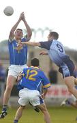 10 July 2004; Liam Keenan, Longford, is tackled by Darren Magee, Dublin. Bank of Ireland Senior Football Championship Qualifier, Round 3, Dublin v Longford, O'Moore Park, Portlaoise, Co. Laois. Picture credit; Pat Murphy / SPORTSFILE