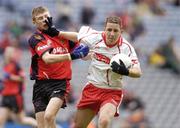 11 July 2004; Gareth Devlin, Tyrone, in action against Padraig Mageehan, Tyrone. Ulster Minor Football Championship Final, Down v Tyrone, Croke Park, Dublin. Picture credit; Damien Eagers / SPORTSFILE