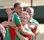 11 July 2004; Kevin Doyle, centre, Cork City, celebrates with team-mates George O'Callaghan, left, and John O'Flynn after scoring his sides first goal. Intertoto Cup, Second round, Second leg, Cork City v NEC Nijmegen, Turners Cross, Cork. Picture credit; David Maher / SPORTSFILE