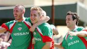11 July 2004; Kevin Doyle, centre, Cork City, celebrates after scoring his sides first goal with team-mates George O'Callaghan , left, and Neale Fenn. Intertoto Cup, Second round, Second leg, Cork City v NEC Nijmegen, Turners Cross, Cork. Picture credit; David Maher / SPORTSFILE