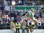 11 July 2004; Kevin Doyle, Cork City, beats Jose Valencia , NEC Nijmegen, to the ball to score his sides first goal. Intertoto Cup, Second round, Second leg, Cork City v NEC Nijmegen, Turners Cross, Cork. Picture credit; David Maher / SPORTSFILE
