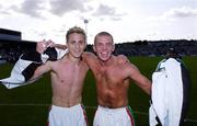 11 July 2004;  Cork City winning goalscorer Kevin Doyle, left, celebrates with team-mate John O'Flynn at the end of the game after victory over NEC Nijmegen. Intertoto Cup, Second round, Second leg, Cork City v NEC Nijmegen, Turners Cross, Cork. Picture credit; David Maher / SPORTSFILE