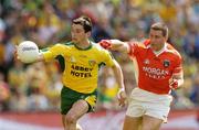 11 July 2004; Michael Hegarty, Donegal, is tackled by Diarmuid Marsden, Armagh. Bank of Ireland Ulster Senior Football Championship Final, Armagh v Donegal, Croke Park, Dublin. Picture credit; Matt Browne / SPORTSFILE