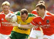 11 July 2004; Adrian Sweeney, Donegal, in action against Tony McEntee, Armagh. Bank of Ireland Ulster Senior Football Championship Final, Armagh v Donegal, Croke Park, Dublin. Picture credit; Matt Browne / SPORTSFILE