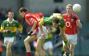 11 July 2004; Rory Keating, Kerry, in action against Ray Carey, Cork. Munster Minor Football Championship Final, Cork v Kerry, Gaelic Grounds, Limerick. Picture credit; Brendan Moran / SPORTSFILE