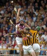11 July 2004; David Tierney, Galway, in action against Peter Barry and Richard Mullally, right, Kilkenny. Guinness Senior Hurling Championship Qualifier, Round 3, Galway v Kilkenny, Semple Stadium, Thurles, Co. Tipperary. Picture credit; Pat Murphy / SPORTSFILE
