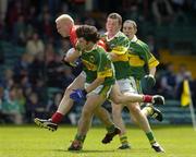 11 July 2004; Sean Dempsey, Cork, in action against Ciaran Kelliher and Luke Quinn, right, Kerry. Munster Minor Football Championship Final, Cork v Kerry, Gaelic Grounds, Limerick. Picture credit; Brendan Moran / SPORTSFILE