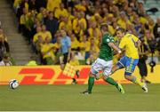 6 September 2013; Anders Svensson, Sweden, shoots to score his side's second goal past Glenn Whelan, Republic of Ireland. 2014 FIFA World Cup Qualifier, Group C, Republic of Ireland v Sweden, Aviva Stadium, Lansdowne Road, Dublin. Picture credit: Matt Browne / SPORTSFILE