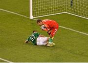 6 September 2013; Sweden goalkeeper Andreas Isaksson gets to the ball ahead of Robbie Keane, Republic of Ireland. 2014 FIFA World Cup Qualifier, Group C, Republic of Ireland v Sweden, Aviva Stadium, Lansdowne Road, Dublin. Picture credit: Brendan Moran / SPORTSFILE