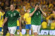 6 September 2013; A dejected John O'Shea and Richard Dunne, left, Republic of Ireland, after the game. 2014 FIFA World Cup Qualifier, Group C, Republic of Ireland v Sweden, Aviva Stadium, Lansdowne Road, Dublin. Picture credit: David Maher / SPORTSFILE