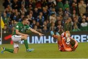 6 September 2013; Robbie Keane, Republic of Ireland, reacts after a challenge on Andreas Isaksson, Sweden. 2014 FIFA World Cup Qualifier, Group C, Republic of Ireland v Sweden, Aviva Stadium, Lansdowne Road, Dublin. Picture credit: Brian Lawless / SPORTSFILE