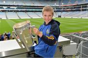 7 September 2013; On the eve of the All-Ireland Hurling Final, Clare hurling legend Jamesie O’Connor gave a unique tour of Croke Park stadium as part of the Bord Gáis Energy Legends Tour Series. Pictured holding the Liam MacCarthy Cup at the tour is Ciarán Jones, aged 11, from Ennis, Co. Clare. The Final Bord Gáis Energy Legends Tour of the year will take place on Saturday, 21st September and will feature former Mayo player, Willie Joe Padden. Full details are available on www.crokepark.ie/events. Croke Park, Dublin. Picture credit: Barry Cregg / SPORTSFILE