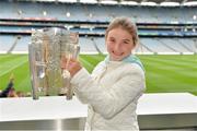 7 September 2013; On the eve of the All-Ireland Hurling Final, Clare hurling legend Jamesie O’Connor gave a unique tour of Croke Park stadium as part of the Bord Gáis Energy Legends Tour Series. Pictured holding the Liam MacCarthy Cup at the tour is Mai Whelan, aged 10, from Ardclough, Co. Kildare. The Final Bord Gáis Energy Legends Tour of the year will take place on Saturday, 21st September and will feature former Mayo player, Willie Joe Padden. Full details are available on www.crokepark.ie/events. Croke Park, Dublin. Picture credit: Barry Cregg / SPORTSFILE