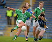 7 September 2013; Aisling Moane, Fermanagh, scores her side's first goal despite the best efforts of Samantha Lambert, Tipperary. TG4 All-Ireland Ladies Football Intermediate Championship, Semi-Final, Fermanagh v Tipperary, Semple Stadium, Thurles, Co. Tipperary. Picture credit: Brendan Moran / SPORTSFILE