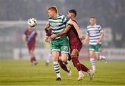 22 October 2023; Rory Gaffney of Shamrock Rovers in action against Luke Heeney of Drogheda United during the SSE Airtricity Men's Premier Division match between Shamrock Rovers and Drogheda United at Tallaght Stadium in Dublin. Photo by Stephen McCarthy/Sportsfile