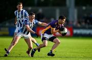 22 October 2023; Rory O'Carroll of Kilmacud Crokes in action against Ryan Basquel of Ballyboden St Endas during the Dublin County Senior Club Football Championship Final between Kilmacud Crokes and Ballyboden St Endas at Parnell Park in Dublin. Photo by Brendan Moran/Sportsfile