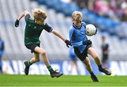 23 October 2023; Cian Brooke of St Attrachta's in action against John Glynn of St Joseph's Terenure during the match between St Joseph's Terenure and St Attrachta's at the Allianz Cumann na mBunscol Finals at Croke Park in Dublin. Photo by Ben McShane/Sportsfile