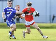 22 October 2023; Sam O'Dowd of Rathnew in action against Kevin Hanlon of Blessington during the Wicklow County Senior Club Football Championship final between Blessington and Rathnew at Echelon Park in Aughrim, Wicklow. Photo by Matt Browne/Sportsfile