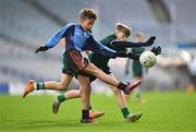 23 October 2023; Noah Nartey of St Attrachta's in action against Conor Ho Flynn during the match between St Joseph's Terenure and St Attrachta's at the Allianz Cumann na mBunscol Finals at Croke Park in Dublin. Photo by Ben McShane/Sportsfile