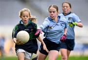 23 October 2023; Sadhbh Ní Earchaí of Gaelscoil Eiscir Riada in action against Sophie Martin of Scoil Mhuire GNS, Lucan, during the match between Gaelscoil Eiscir Riada and Scoil Mhuire GNS, Lucan, at the Allianz Cumann na mBunscol Finals at Croke Park in Dublin. Photo by Ben McShane/Sportsfile