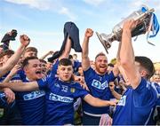 22 October 2023; Ardee St Mary's players celebrate with the Joe Ward Cup after the Louth County Senior Club Football Championship final between Ardee St Mary's and Naomh Mairtin at Pairc Naomh Bríd in Dowdallshill, Louth. Photo by Stephen Marken/Sportsfile
