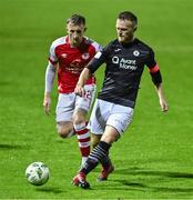 23 October 2023; David Cawley of Sligo Rovers in action against Sam Curtis of St Patrick's Athletic during the SSE Airtricity Premier Division match between St Patrick's Athletic and Sligo Rovers at Richmond Park in Dublin. Photo by Piaras Ó Mídheach/Sportsfile