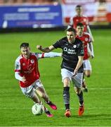 23 October 2023; Garry Buckley of Sligo Rovers in action against Jason McClelland of St Patrick's Athletic during the SSE Airtricity Premier Division match between St Patrick's Athletic and Sligo Rovers at Richmond Park in Dublin. Photo by Piaras Ó Mídheach/Sportsfile