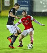 23 October 2023; Garry Buckley of Sligo Rovers in action against Jason McClelland of St Patrick's Athletic during the SSE Airtricity Premier Division match between St Patrick's Athletic and Sligo Rovers at Richmond Park in Dublin. Photo by Piaras Ó Mídheach/Sportsfile