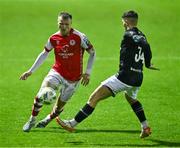 23 October 2023; Jamie Lennon of St Patrick's Athletic in action against Kailin Barlow during the SSE Airtricity Premier Division match between St Patrick's Athletic and Sligo Rovers at Richmond Park in Dublin. Photo by Piaras Ó Mídheach/Sportsfile