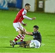 23 October 2023; Jamie Lennon of St Patrick's Athletic is tackled by Niall Morahan of Sligo Rovers during the SSE Airtricity Premier Division match between St Patrick's Athletic and Sligo Rovers at Richmond Park in Dublin. Photo by Piaras Ó Mídheach/Sportsfile