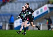 24 October 2023; Rolestown NS players Maisy Ryan, right, and Sarah Wade celebrate after their victory in the match between Rolestown NS and Bayside SNS at the Allianz Cumann na mBunscol Finals at Croke Park in Dublin. Photo by Ben McShane/Sportsfile