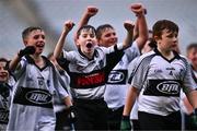 24 October 2023; Liam Scanlon of St Joseph's NS Clondalkin, centre, celebrates with teammates after the match between St Joseph's NS Clondalkin and Gaelscoil Míde at the Allianz Cumann na mBunscol Finals at Croke Park in Dublin. Photo by Ben McShane/Sportsfile