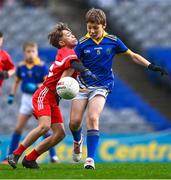24 October 2023; Fionn Byrne of St Mochta's NS in action against Charlie Brennan of St Benedict's National School during the match between St Mochta's NS and St Benedict's National School at the Allianz Cumann na mBunscol Finals at Croke Park in Dublin. Photo by Ben McShane/Sportsfile