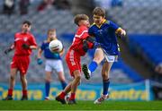 24 October 2023; Fionn Byrne of St Mochta's NS in action against Charlie Brennan of St Benedict's National School during the match between St Mochta's NS and St Benedict's National School at the Allianz Cumann na mBunscol Finals at Croke Park in Dublin. Photo by Ben McShane/Sportsfile