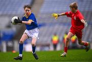 24 October 2023; Matthew Coyne of St Mochta's NS in action against Robert Mellett of St Benedict's National School during the match between St Mochta's NS and St Benedict's National School at the Allianz Cumann na mBunscol Finals at Croke Park in Dublin. Photo by Ben McShane/Sportsfile