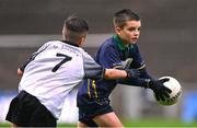 24 October 2023; Cayden Breathnach of Gaelscoil Míde in action against Ryan Hickey of St Joseph's NS Clondalkin during the match between St Joseph's NS Clondalkin and Gaelscoil Míde at the Allianz Cumann na mBunscol Finals at Croke Park in Dublin. Photo by Ben McShane/Sportsfile