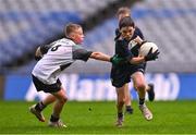 24 October 2023; Liam Ó Domhnaill of Gaelscoil Míde in action against Aaron Keegan of St Joseph's NS Clondalkin during the match between St Joseph's NS Clondalkin and Gaelscoil Míde at the Allianz Cumann na mBunscol Finals at Croke Park in Dublin. Photo by Ben McShane/Sportsfile