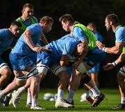 24 October 2023; Rhys Ruddock, centre, is tackled by Diarmuid Mangan during Leinster Rugby squad training at UCD in Dublin. Photo by Harry Murphy/Sportsfile
