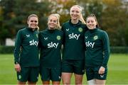 25 October 2023; Players, from left, Jamie Finn, Lily Agg, Louise Quinn and Lucy Quinn pose for a photograph following a Republic of Ireland women training session at the FAI National Training Centre in Abbotstown, Dublin. Photo by Stephen McCarthy/Sportsfile