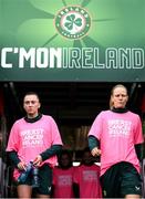 26 October 2023; Abbie Larkin, left, and Diane Caldwell wearing pink t-shirt's to promote Breast Cancer Ireland's awareness month during a Republic of Ireland women training session at Tallaght Stadium in Dublin. Photo by Stephen McCarthy/Sportsfile