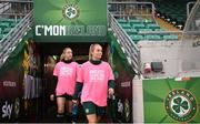 26 October 2023; Lily Agg and Megan Connolly, left, wearing pink t-shirt's to promote Breast Cancer Ireland's awareness month during a Republic of Ireland women training session at Tallaght Stadium in Dublin. Photo by Stephen McCarthy/Sportsfile