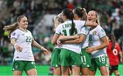 27 October 2023; Katie McCabe of Republic of Ireland is congratulated by teammates after scoring their side's first goal during the UEFA Women's Nations League B match between Republic of Ireland and Albania at Tallaght Stadium in Dublin. Photo by David Fitzgerald/Sportsfile